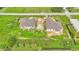 Aerial view showing two completed homes and surrounding landscape at 840 Voight N Ave, Fort Meade, FL 33841