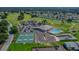 Community clubhouse with pool, tennis and pickleball courts at 1058 Penguin Pl, Lakeland, FL 33809