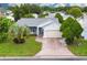 Attractive single-story home with brick driveway at 1058 Penguin Pl, Lakeland, FL 33809