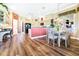 Kitchen with breakfast nook, granite counters, and hardwood floors at 7042 Montreal Dr, Lakeland, FL 33810