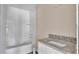 Clean bathroom with granite countertop and white subway tile at 1033 Lakewood Ct, Lakeland, FL 33801