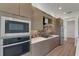 Modern kitchen with stainless steel appliances and an island at 1969 Grasslands Blvd, Lakeland, FL 33803