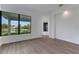 Bright and spacious living area with a water view at 1969 Grasslands Blvd, Lakeland, FL 33803