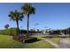 Tennis courts with seating and landscaping at 1969 Grasslands Blvd, Lakeland, FL 33803