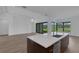Modern kitchen with island and water view at 1969 Grasslands Blvd, Lakeland, FL 33803