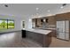Modern kitchen with stainless steel appliances and an island at 1969 Grasslands Blvd, Lakeland, FL 33803