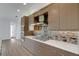 Modern kitchen with stainless steel appliances and an island at 1969 Grasslands Blvd, Lakeland, FL 33803