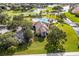 Community pool with clubhouse and landscaping at 1969 Grasslands Blvd, Lakeland, FL 33803