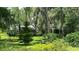 Ranch-style home nestled in a wooded, private setting at 7520 Kathleen Rd, Lakeland, FL 33810