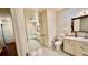 Large bathroom with double vanity, toilet, and shower at 7520 Kathleen Rd, Lakeland, FL 33810