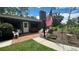 Brick patio with seating area and American flag at 7520 Kathleen Rd, Lakeland, FL 33810