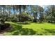 Expansive grassy backyard, ideal for outdoor activities at 7520 Kathleen Rd, Lakeland, FL 33810