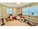 Office or playroom with built-in shelves and window at 7520 Kathleen Rd, Lakeland, FL 33810