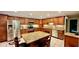 Spacious kitchen featuring granite countertops and stainless steel appliances at 7520 Kathleen Rd, Lakeland, FL 33810
