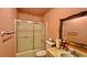 Clean bathroom with a shower/tub combo and updated vanity at 7520 Kathleen Rd, Lakeland, FL 33810