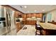 Spacious kitchen with granite countertops and stainless steel appliances at 7520 Kathleen Rd, Lakeland, FL 33810