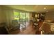 Relaxing living room with hardwood floors and rocking chairs at 7520 Kathleen Rd, Lakeland, FL 33810
