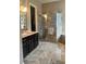 Spa-like bathroom with walk-in shower and vanity at 961 Christina Chase Dr, Lakeland, FL 33813