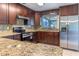 Updated kitchen, featuring stainless steel appliances and granite countertops at 2508 Providence Rd, Lakeland, FL 33805