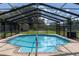 Inviting screened-in pool with brick pavers at 2508 Providence Rd, Lakeland, FL 33805