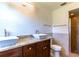 Bathroom boasts double vanity sinks, granite countertop, and shower stall at 2508 Providence Rd, Lakeland, FL 33805
