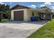Single car garage with covered patio area at 2508 Providence Rd, Lakeland, FL 33805