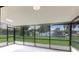Spacious screened patio overlooking backyard with plenty of natural light at 2508 Providence Rd, Lakeland, FL 33805