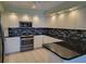 Spacious kitchen, granite countertops, stainless steel appliances at 727 Martinique Cir, Lakeland, FL 33803