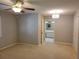 Main bedroom with access to bathroom and closets at 727 Martinique Cir, Lakeland, FL 33803