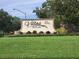 Community entrance sign, Villas by the Lake at 727 Martinique Cir, Lakeland, FL 33803