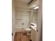 Bathroom with bathtub, toilet and vanity with drawers at 727 Martinique Cir, Lakeland, FL 33803