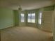 Bright bedroom with ceiling fan and view at 727 Martinique Cir, Lakeland, FL 33803