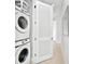 Stackable washer and dryer in a spacious laundry room at 7770 Sandy Ridge Dr # 115, Reunion, FL 34747