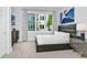King-size bed, window with curtains, and modern decor at 7770 Sandy Ridge Dr # 115, Reunion, FL 34747