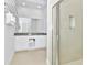 Double vanity, large mirror, and walk-in shower at 7770 Sandy Ridge Dr # 115, Reunion, FL 34747