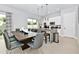Modern kitchen with island and stainless steel appliances at 7770 Sandy Ridge Dr # 115, Reunion, FL 34747