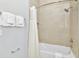 Tub shower combination with white tile surround at 7770 Sandy Ridge Dr # 115, Reunion, FL 34747