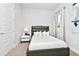 Full-size bed, window with curtains, and modern decor at 7770 Sandy Ridge Dr # 115, Reunion, FL 34747