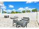 Outdoor patio with seating and dining areas at 7770 Sandy Ridge Dr # 115, Reunion, FL 34747