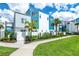 Modern three-story building with blue and white accents at 7770 Sandy Ridge Dr # 115, Reunion, FL 34747