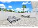 Relaxing patio area with lounge chairs and modern pavers at 7770 Sandy Ridge Dr # 115, Reunion, FL 34747