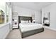 King-size bed, large window, and modern decor in a spacious bedroom at 7770 Sandy Ridge Dr # 115, Reunion, FL 34747