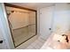 Bathroom with walk-in shower and tiled floors at 2646 Handley Blvd, Lakeland, FL 33803