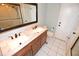 Bathroom with double vanity, large mirror and shower at 2646 Handley Blvd, Lakeland, FL 33803