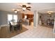 Bright dining room features a large table with seating for six and access to the kitchen at 2646 Handley Blvd, Lakeland, FL 33803