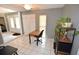 Home office with built-in shelving and view into the foyer at 2646 Handley Blvd, Lakeland, FL 33803