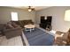 Spacious living room with sectional sofa and large TV at 2646 Handley Blvd, Lakeland, FL 33803