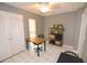 Bright home office features built-in shelving, desk, and tile floors at 2646 Handley Blvd, Lakeland, FL 33803