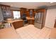 Modern kitchen boasts stainless steel appliances and ample wood cabinetry at 2646 Handley Blvd, Lakeland, FL 33803