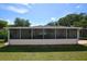Large screened patio with seating area at 2646 Handley Blvd, Lakeland, FL 33803